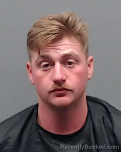Mugshot of ALEC TREVOR TOPPINGS booked in Smith County, Texas on May 24, 2026