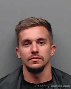 Mugshot of AUSTIN RYAN MCGINNIS booked in Smith County, Texas on May 26, 2026