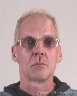 Mugshot of RAYMOND ETHRIDGE