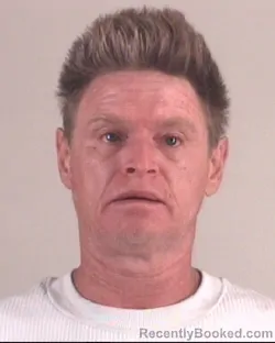 Mugshot of JUSTIN WILLIAMS