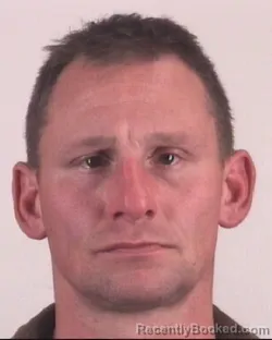 Mugshot of KYLE GREZESZAK