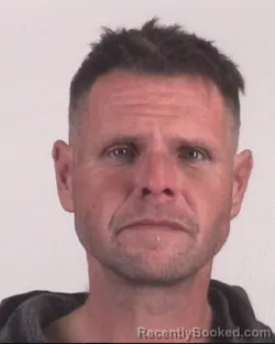 Mugshot of TRINTON THOMAS