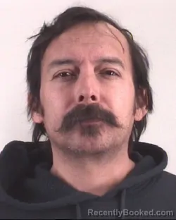 Mugshot of BENJAMIN RAZO