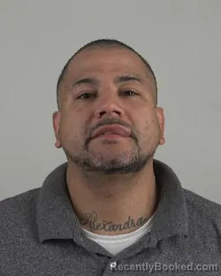 Mugshot of Joeangelo Ambriz booked in Tarrant County, Texas on October 8, 2026