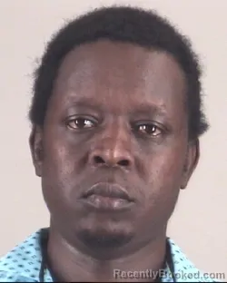 Mugshot of COSMAS YEGO booked in Tarrant County, Texas on March 25, 2026