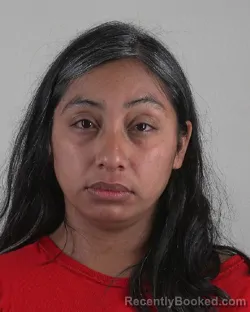 Mugshot of Aphalie Flores booked in Tarrant County, Texas on October 4, 2026