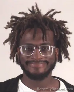 Mugshot of MILES AZINGE booked in Tarrant County, Texas on April 2, 2026