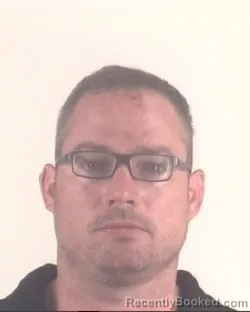 Mugshot of JUSTIN DENSON