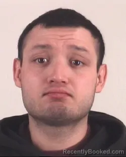 Mugshot of AUSTIN RESIO