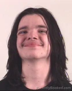 Mugshot of CAVEN SIMMONS