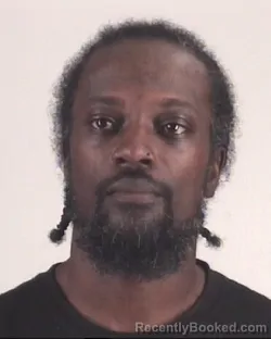 Mugshot of CERSHAMBERT JOHNS booked in Tarrant County, Texas on April 16, 2026