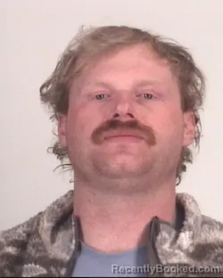 Mugshot of WILLIAM HUGHES