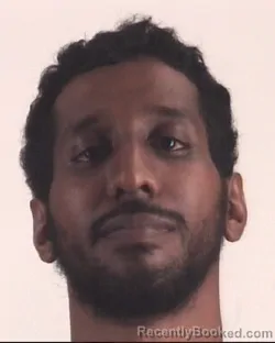 Mugshot of KAMAL MOHAMED