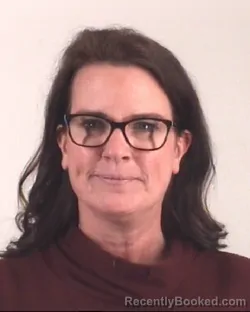 Mugshot of OLIVIA MCPEEK booked in Tarrant County, Texas on March 11, 2026