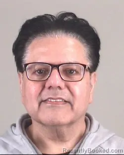 Mugshot of IQBAL MALANI booked in Tarrant County, Texas on March 25, 2026