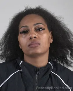 Mugshot of Domonique Donegan booked in Tarrant County, Texas on October 4, 2026