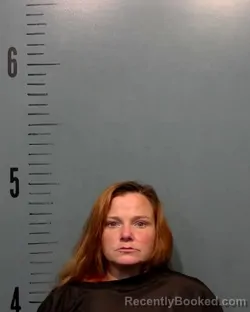 Mugshot of Crystal Lea Burkhead booked in Taylor County, Texas on May 21, 2026
