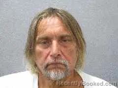 Mugshot of Arnold Andrew Asiala booked in Monroe County, Florida on September 4, 2026