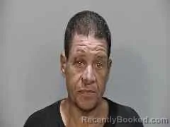 Mugshot of John Acosta booked in Monroe County, Florida on October 26, 2026