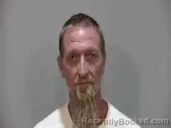 Mugshot of Johnny Lee Burger booked in Monroe County, Florida on August 28, 2026