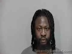 Mugshot of JEAN MIKERNSON CHARLES