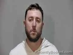 Mugshot of Spencer Owen Carril booked in Monroe County, Florida on August 15, 2026