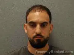 Mugshot of Ernesto Daniel Delgado booked in Monroe County, Florida on August 22, 2026
