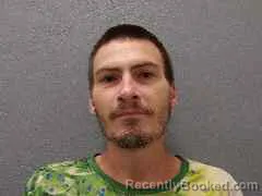 Mugshot of JUSTIN PHILIP DONEHOO booked in Monroe County, Florida on May 4, 2026