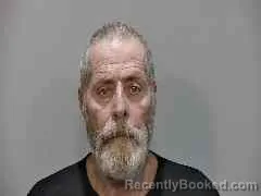 Mugshot of John Lewis Evans booked in Monroe County, Florida on August 21, 2026