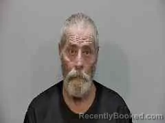 Mugshot of John Lewis Evans booked in Monroe County, Florida on August 21, 2026