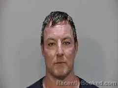 Mugshot of Justin Tyme Holt booked in Monroe County, Florida on August 29, 2026