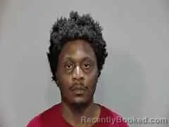 Mugshot of TYSHOUNTIS ZYIRON HUGHES