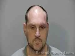 Mugshot of MIKHY KIANI SCOTT KING BROCK