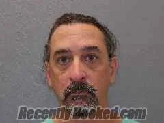 Booking photo from Monroe County, Florida