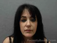 Mugshot of ELIZABETH MARTINEZ booked in Monroe County, Florida on April 22, 2026