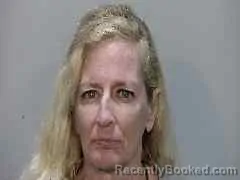 Mugshot of KELLY LYNN NESBIT booked in Monroe County, Florida on August 4, 2026