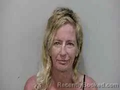 Mugshot of Kelly Lynn Nesbit booked in Monroe County, Florida on August 29, 2026