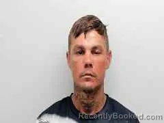 Mugshot of DEVIN MICHAEL POLITIS booked in Monroe County, Florida on July 14, 2026