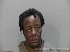 Mugshot of MIRLENE PETIT DIEU