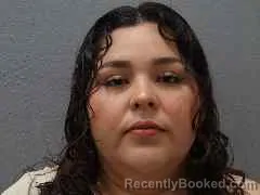 Mugshot of ASTRID DINORA ROQUE RAMOS booked in Monroe County, Florida on April 25, 2026