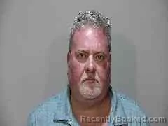 Mugshot of JOHN RICHARD REINHARDT