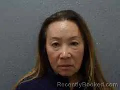 Mugshot of JUN WANG SHORE booked in Monroe County, Florida on May 12, 2026