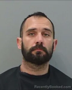 Mugshot of JOSHUA WOODWARD