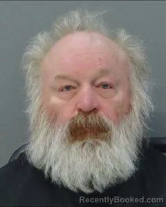 Mugshot of RYAN POAGUE