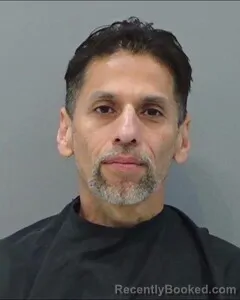 Mugshot of THOMAS FLORES