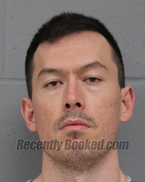Booking photo from Travis County, Texas
