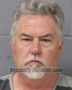 Booking photo from Travis County, Texas