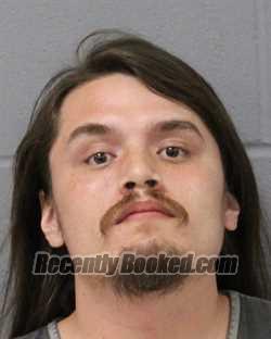 Booking photo from Travis County, Texas