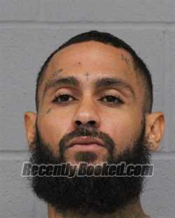 Booking photo from Travis County, Texas