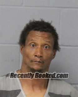 Booking photo from Travis County, Texas